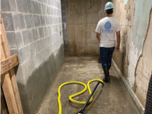 FloodCo expert at a sewage cleaning site