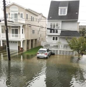 Flooded homeowner’s vehicle in driveway of Staten Island, NY 10301
