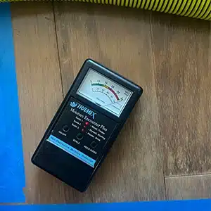 moisture meter reads on red for high moisture