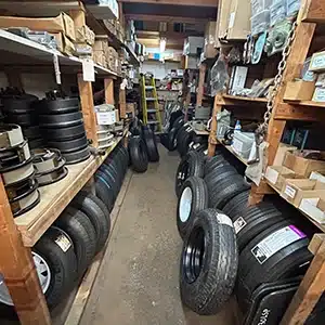 Mid-cleaning snapshot of the tire storage area in a New Jersey shop.