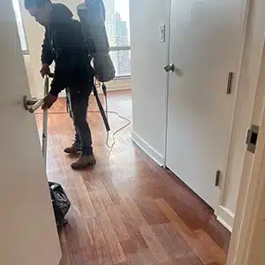 floor restoration process. Technician sanding the floors to even out the floors