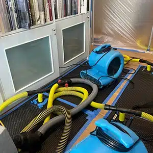 drying equipment set up to dry floors from water damage.
